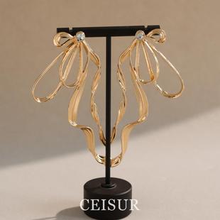 S925純銀淺金色蝴蝶結(jié)飄帶耳釘女獨特夸張海邊度假風漂亮氣質(zhì)耳飾