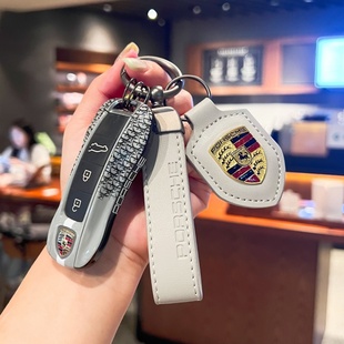 適用于保時捷卡宴Macan鑰匙殼帕拉梅拉車911Taycan套718高檔包扣